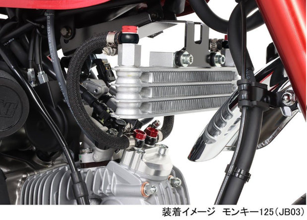 Close-up of a motorcycle engine with visible branding