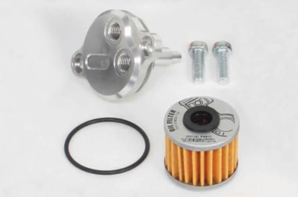 Oil filter and its components on a white background