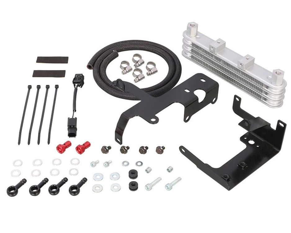 Collection of automotive parts including metal brackets, hoses, and small components on a white background