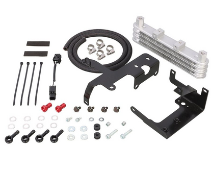 Collection of automotive parts including metal brackets, hoses, and small components on a white background