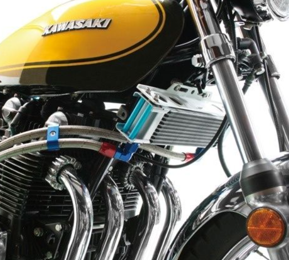 Close-up of a Kawasaki motorcycle engine with visible branding.