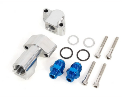 Mechanical parts including a silver fitting, blue connectors, and various metal components on a white background.