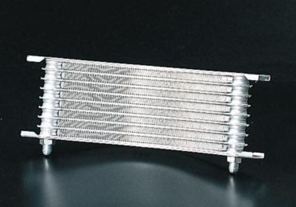 Metallic heat exchanger on a black background