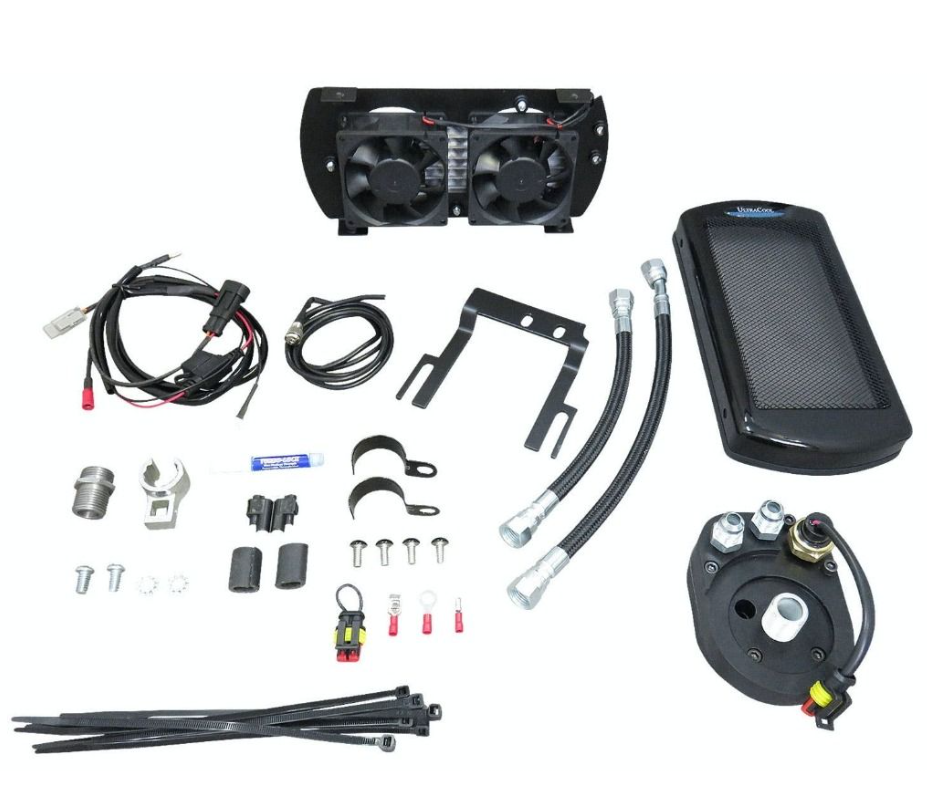 Collection of automotive parts including fans, wiring, and filters on a white background