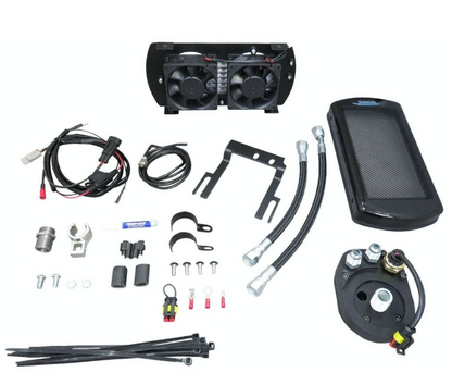 Collection of automotive parts including fans, wiring, and filters on a white background