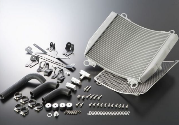 Car radiator and related components on a reflective surface