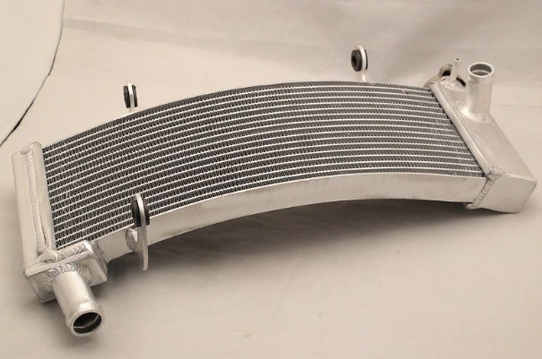 Metallic radiator on a light gray background