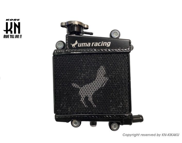Uma Racing radiator on a white background with K&N logo.