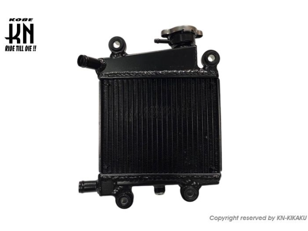 Black radiator with KORE branding on a white background