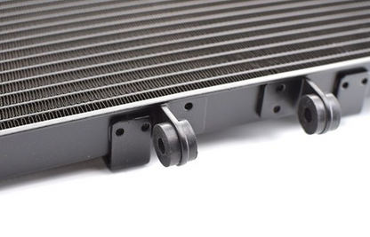 Close-up of a car radiator on a white background