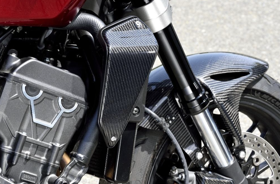 Close-up of a motorcycle with a carbon fiber air deflector