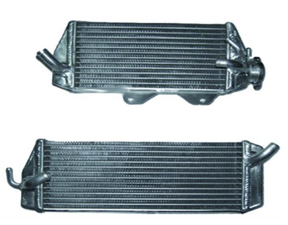 Two metal radiators on a white background