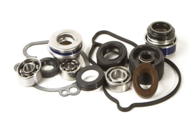 Collection of mechanical bearings and seals on a white background