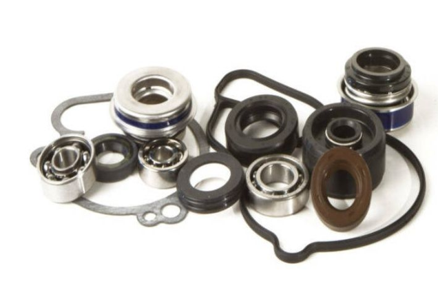 Collection of mechanical bearings and seals on a white background