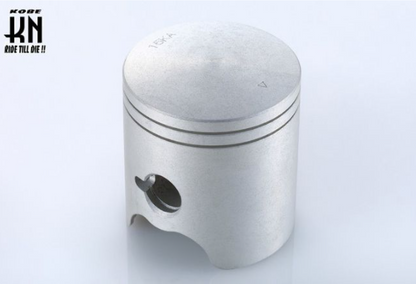 Metal piston on a light gray background with K&N logo.