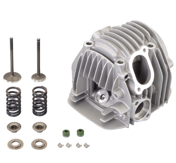 Engine cylinder head with various components on a white background