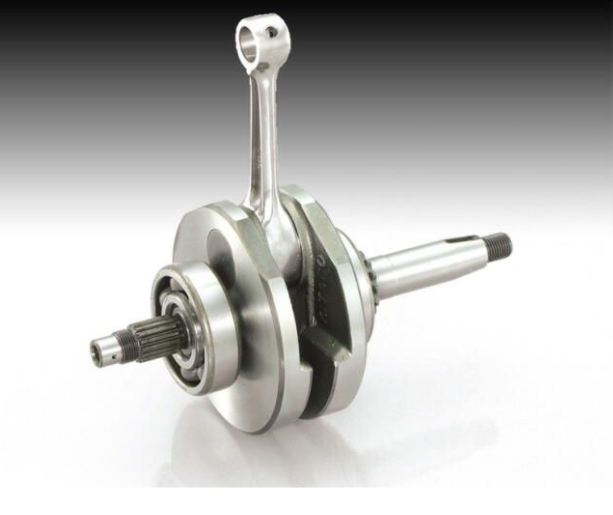 Metallic crankshaft on a gradient background
