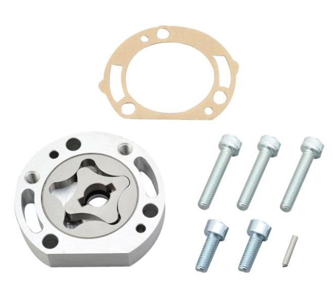 Mechanical assembly with a metal component, gasket, and screws on a white background