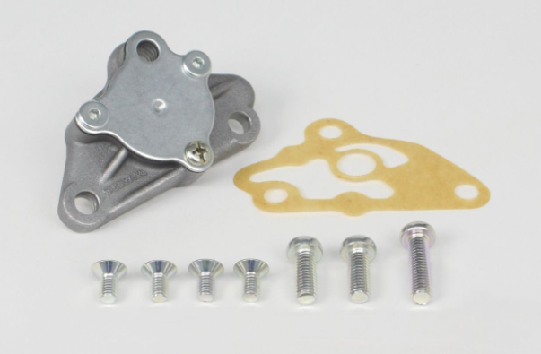 Mechanical assembly with metal component, gasket, and screws on a white background
