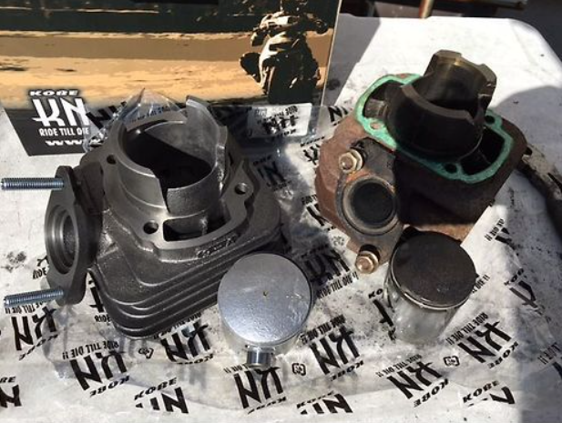 Mechanical parts on a KTM branded surface