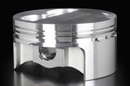Metallic piston on a black background