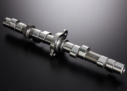 Metal camshaft on a dark background