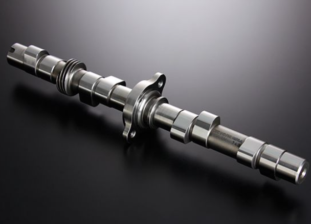 Metal camshaft on a dark background