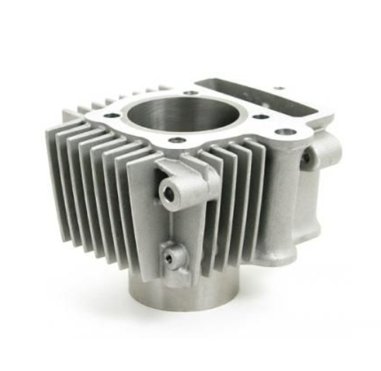 Metal engine cylinder head on a white background