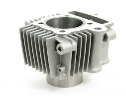 Metal engine cylinder head on a white background