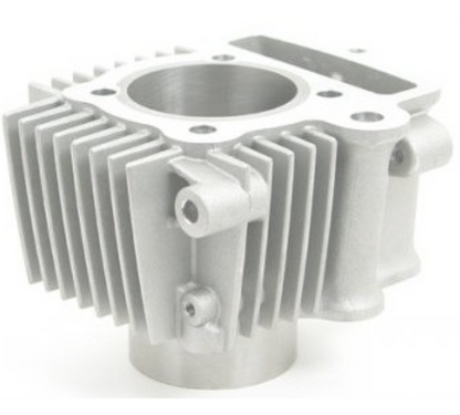 Metallic engine cylinder head on a white background