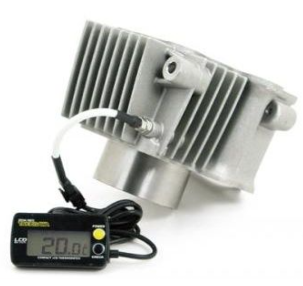 Metallic device with a digital display on a white background