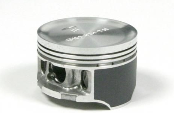 Metallic piston on a white background