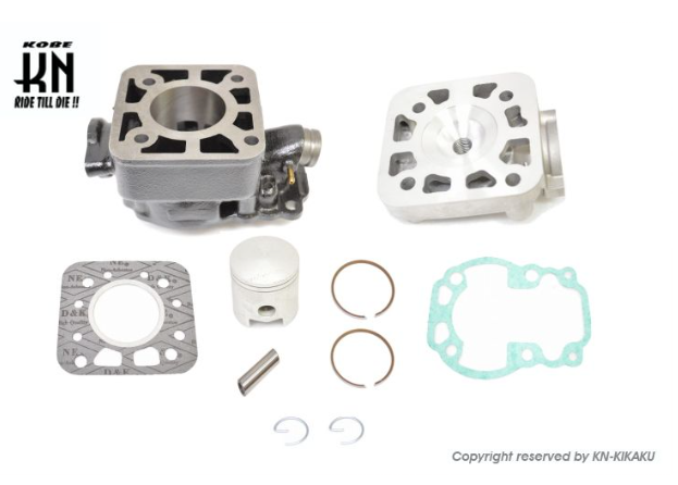 Engine cylinder head kit with various components on a white background, featuring the KOKA brand.