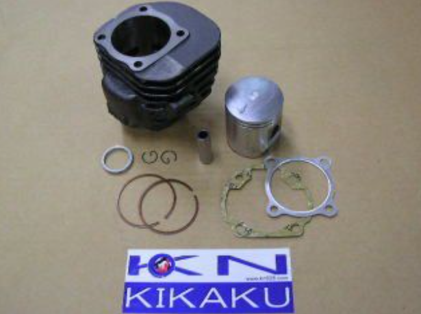 Engine piston and cylinder kit with gaskets and rings on a beige background, featuring Kikaku logo.