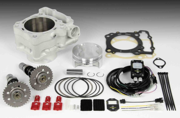 Engine parts including a cylinder head, pistons, gaskets, and various components on a white background.