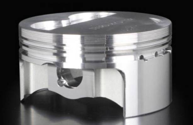 Metallic piston on a black background