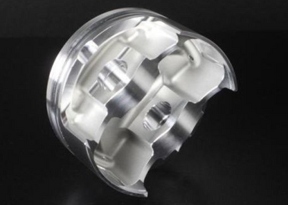 Metallic mechanical component on a black background