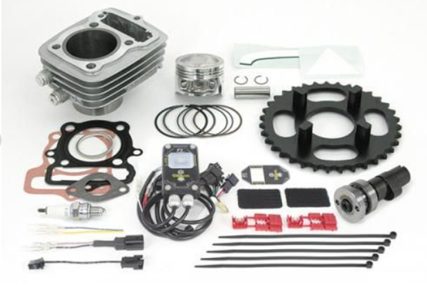Collection of motorcycle engine parts on a white background