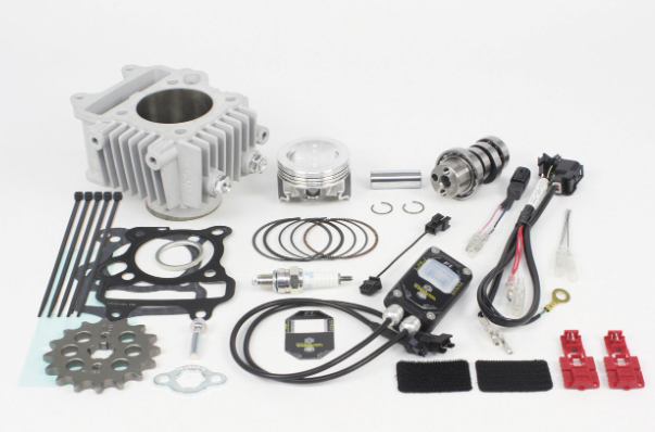 Collection of mechanical parts and tools on a white background