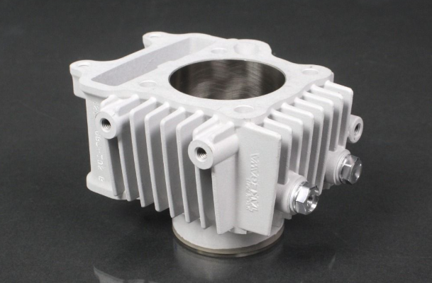 White mechanical component on a black background