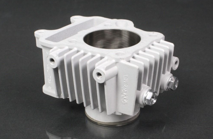 White mechanical component on a black background