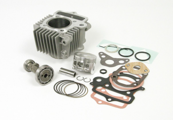 Engine parts including a cylinder head, piston, rings, and gaskets on a white background