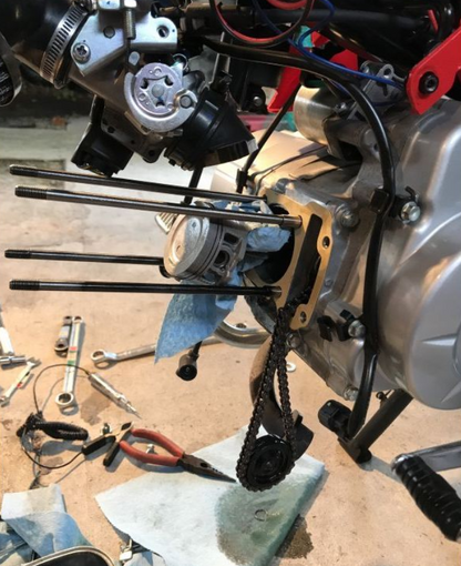 Engine repair work with tools on a workbench