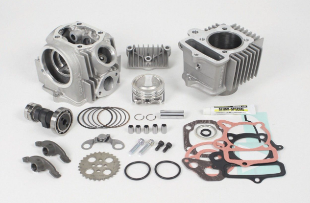 Engine parts including cylinders, gaskets, and bearings on a white background