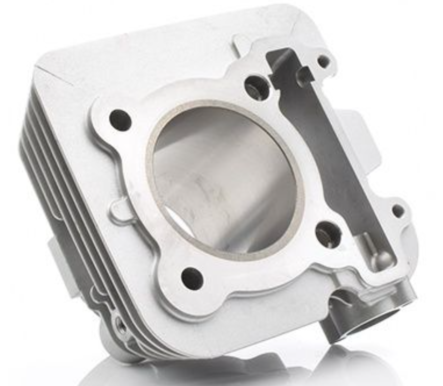Metallic engine cylinder head on a white background