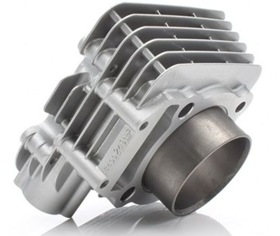 Metal engine cylinder block on a white background