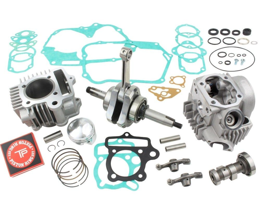 Engine parts and gaskets on a white background