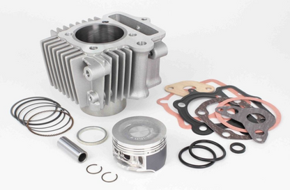Engine parts including a cylinder, piston, rings, and gaskets on a white background