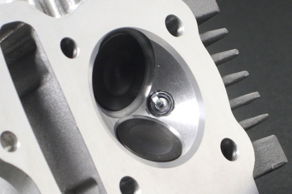 Close-up of a mechanical component with gears and metal parts.