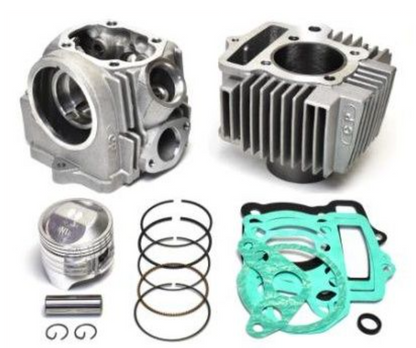 Engine cylinder head, piston, rings, and gaskets on a white background